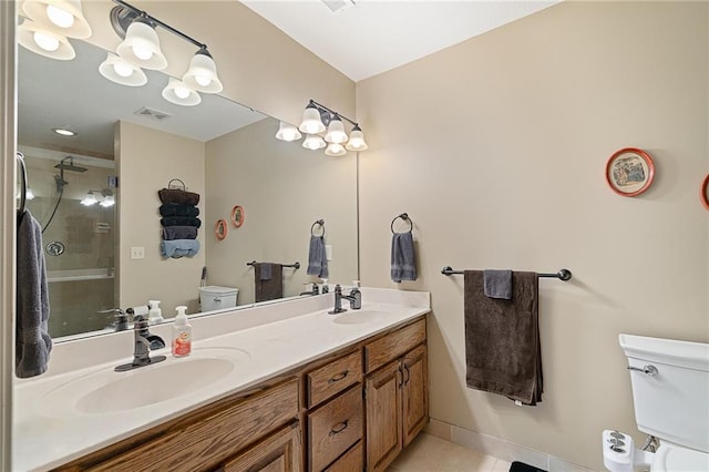 1611 NW Creekland Dr, Grain Valley, MO 64029 - full bath with toilet, double vanity, a shower with shower door, and tile patterned flooring