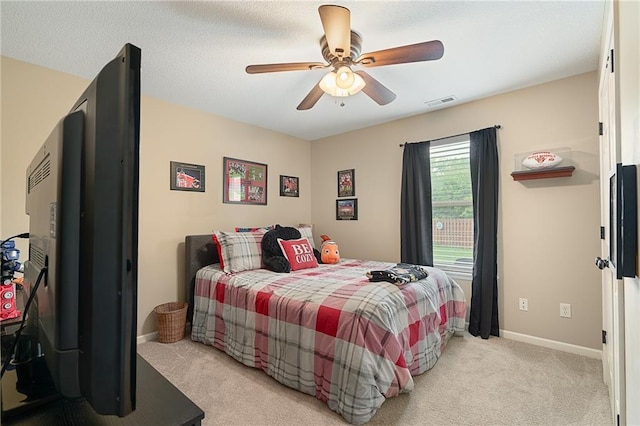 1611 NW Creekland Dr, Grain Valley, MO 64029 - bedroom with light carpet, baseboards, and a ceiling fan