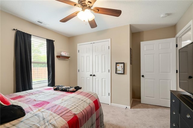 1611 NW Creekland Dr, Grain Valley, MO 64029 - bedroom featuring multiple windows, light colored carpet, a closet, and ceiling fan