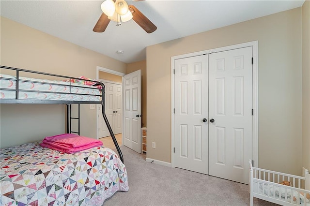1611 NW Creekland Dr, Grain Valley, MO 64029 - bedroom with light carpet, a closet, a ceiling fan, and baseboards