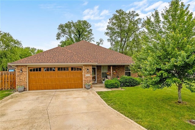 1611 NW Creekland Dr, Grain Valley, MO 64029 - single story home featuring an attached garage, driveway, brick siding, and roof with shingles