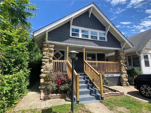 3208 E 31st St, Kansas City, MO 64128 - view of front of house with covered porch