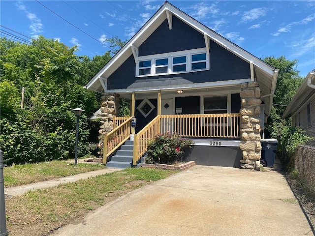 3208 E 31st St, Kansas City, MO 64128 - view of front of house with covered porch