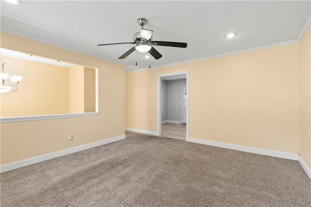 5317 NE 46th St, Kansas City, MO 64117 - spare room with crown molding, carpet, ceiling fan, baseboards, and a chandelier