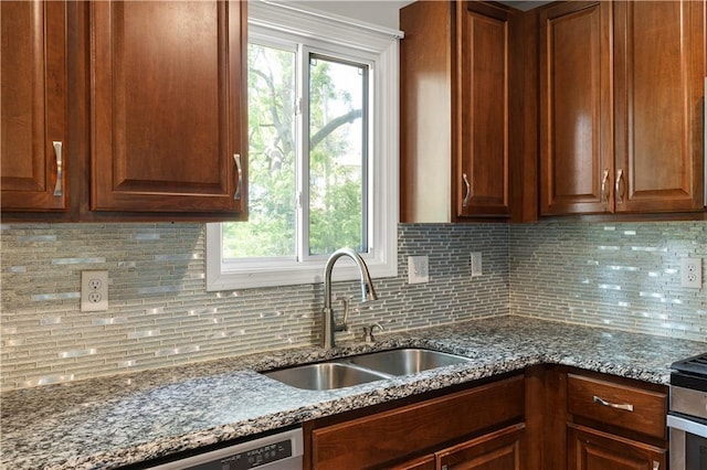 5317 NE 46th St, Kansas City, MO 64117 - kitchen with a sink, tasteful backsplash, and dark stone counters