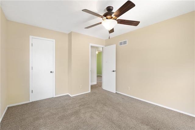 5317 NE 46th St, Kansas City, MO 64117 - unfurnished bedroom featuring carpet, baseboards, and ceiling fan
