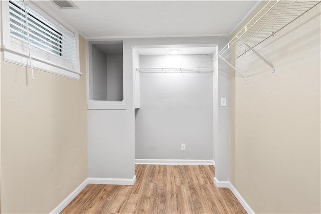 5317 NE 46th St, Kansas City, MO 64117 - walk in closet with light wood-style flooring