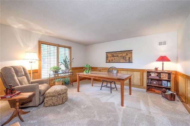 15243 Long St, Overland Park, KS 66221 - office area featuring a wainscoted wall, light colored carpet, a textured ceiling, and wood walls