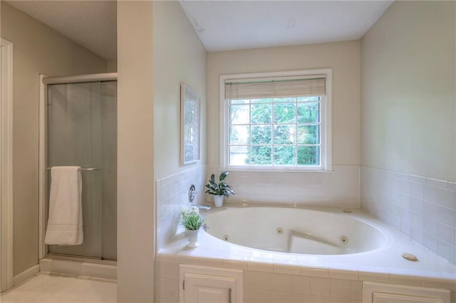 15243 Long St, Overland Park, KS 66221 - full bath featuring a stall shower and a whirlpool tub