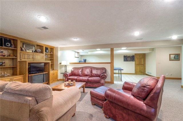 15243 Long St, Overland Park, KS 66221 - living area featuring a textured ceiling, light carpet, baseboards, and recessed lighting