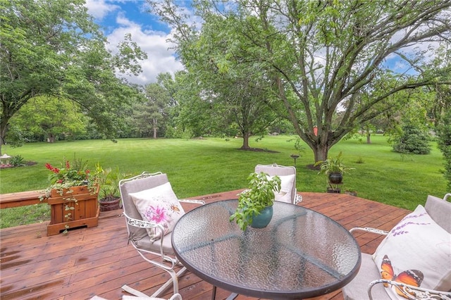 15243 Long St, Overland Park, KS 66221 - wooden terrace with a lawn, view of wooded area, and outdoor dining area