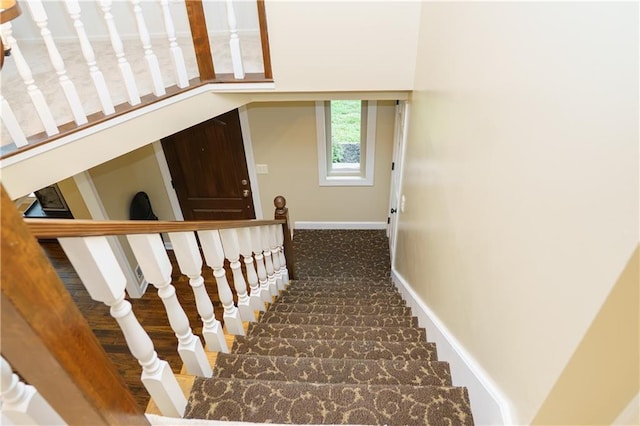204 NW Redwood Ct, Lees Summit, MO 64064 - stairway with baseboards and carpet floors