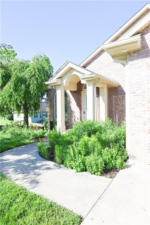 2404 Edmonds Ct, Columbia, MO 65203 - doorway to property featuring brick siding