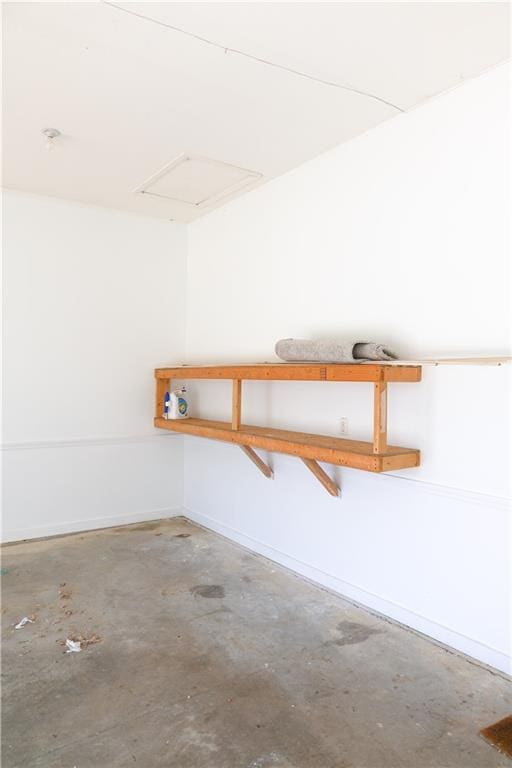2404 Edmonds Ct, Columbia, MO 65203 - garage featuring baseboards