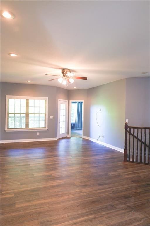 2404 Edmonds Ct, Columbia, MO 65203 - empty room with ceiling fan, baseboards, healthy amount of natural light, recessed lighting, and dark wood-style floors
