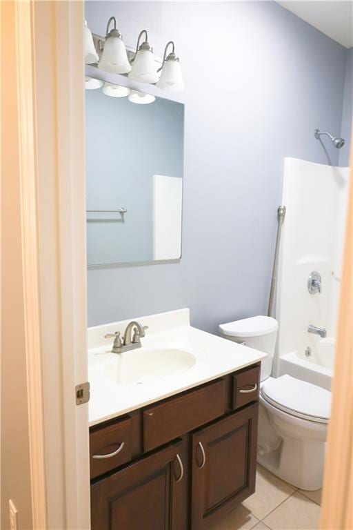2404 Edmonds Ct, Columbia, MO 65203 - bathroom with vanity, tile patterned floors, toilet, and tub / shower combination