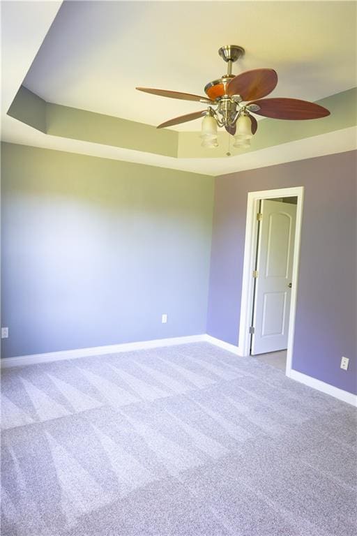 2404 Edmonds Ct, Columbia, MO 65203 - spare room featuring carpet floors, ceiling fan, and baseboards
