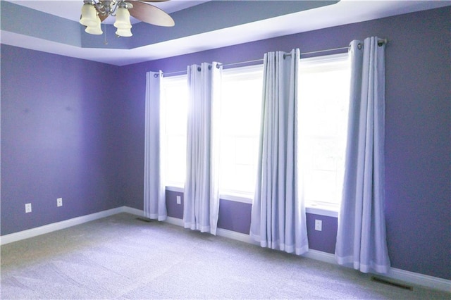 2404 Edmonds Ct, Columbia, MO 65203 - carpeted spare room with healthy amount of natural light, baseboards, and ceiling fan