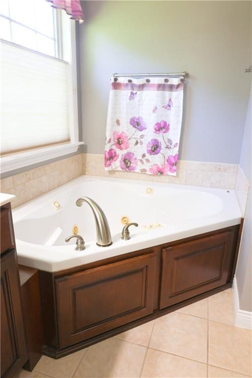 2404 Edmonds Ct, Columbia, MO 65203 - full bathroom with a tub with jets and tile patterned floors