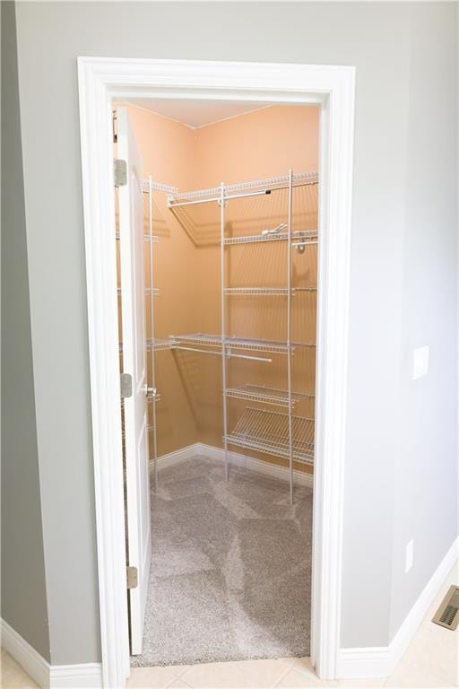 2404 Edmonds Ct, Columbia, MO 65203 - walk in closet featuring carpet flooring