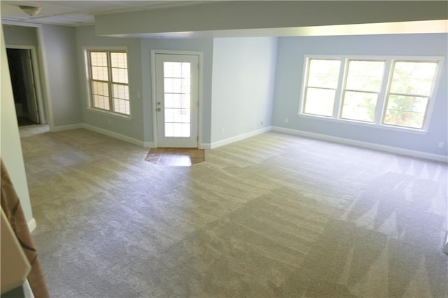 2404 Edmonds Ct, Columbia, MO 65203 - empty room featuring carpet flooring, baseboards, and healthy amount of natural light