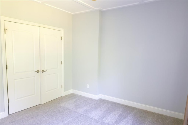 2404 Edmonds Ct, Columbia, MO 65203 - unfurnished bedroom with carpet flooring, baseboards, and a closet