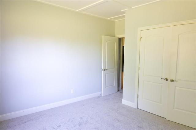 2404 Edmonds Ct, Columbia, MO 65203 - unfurnished bedroom featuring carpet floors, a closet, and baseboards