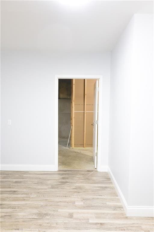 2404 Edmonds Ct, Columbia, MO 65203 - spare room featuring baseboards and light wood-style flooring