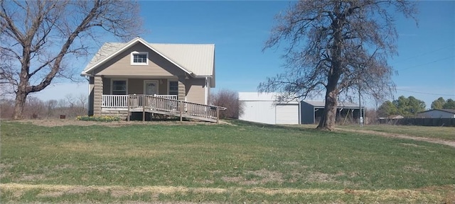 373 SW 1200th Rd, Chilhowee, MO 64733 - view of front of property with a porch, a front lawn, and an outdoor structure