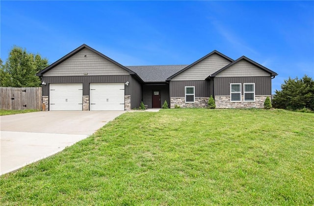 151 SE 225th Rd, Warrensburg, MO 64093 - view of front of property featuring stone siding, a garage, driveway, and board and batten siding