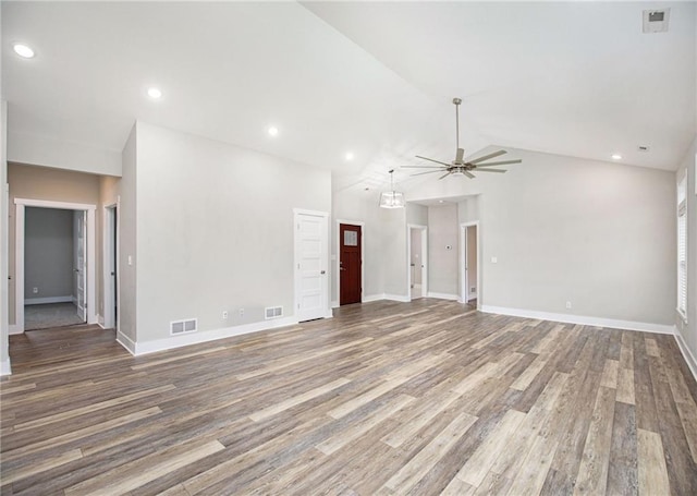 151 SE 225th Rd, Warrensburg, MO 64093 - unfurnished living room featuring a ceiling fan, wood finished floors, baseboards, vaulted ceiling, and recessed lighting