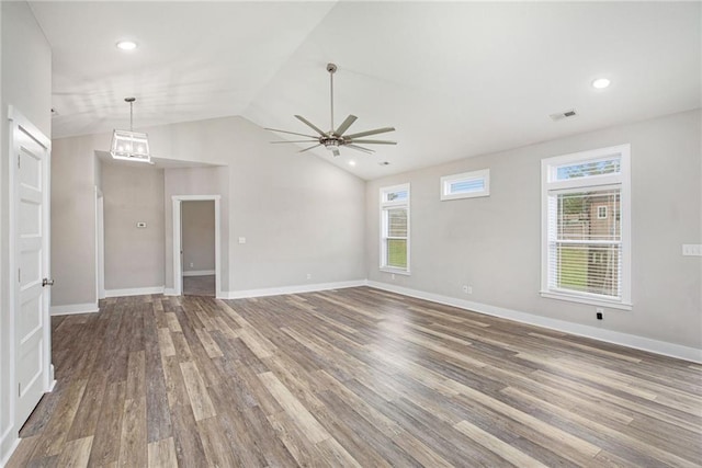 151 SE 225th Rd, Warrensburg, MO 64093 - unfurnished living room featuring wood finished floors, lofted ceiling, ceiling fan, plenty of natural light, and baseboards