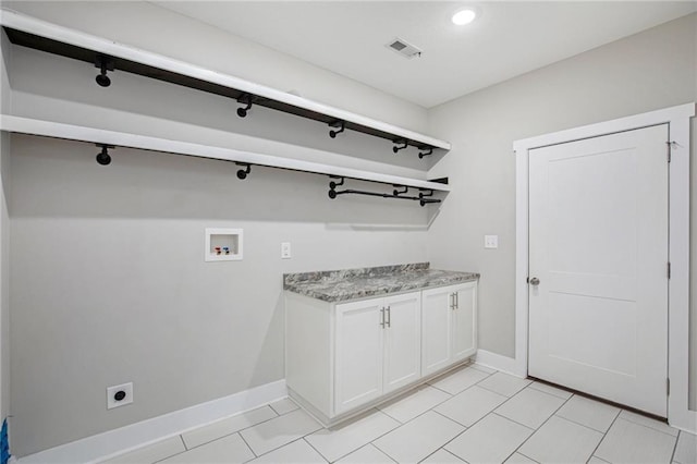 151 SE 225th Rd, Warrensburg, MO 64093 - washroom featuring electric dryer hookup, washer hookup, baseboards, light tile patterned floors, and recessed lighting