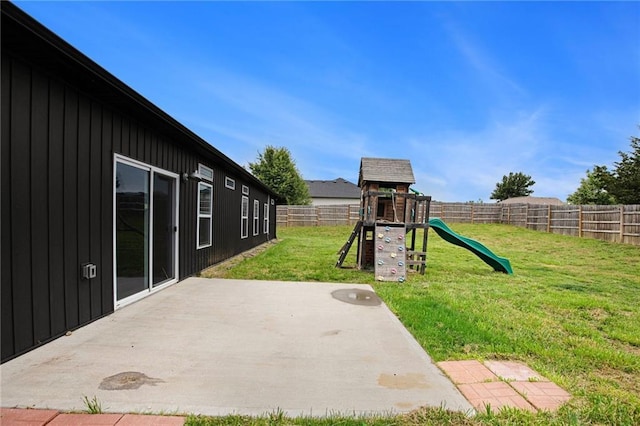 151 SE 225th Rd, Warrensburg, MO 64093 - view of yard with a playground and a patio area