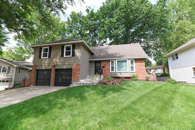 8922 Hadley St, Overland Park, KS 66212 - split level home featuring brick siding, a garage, concrete driveway, and a front yard