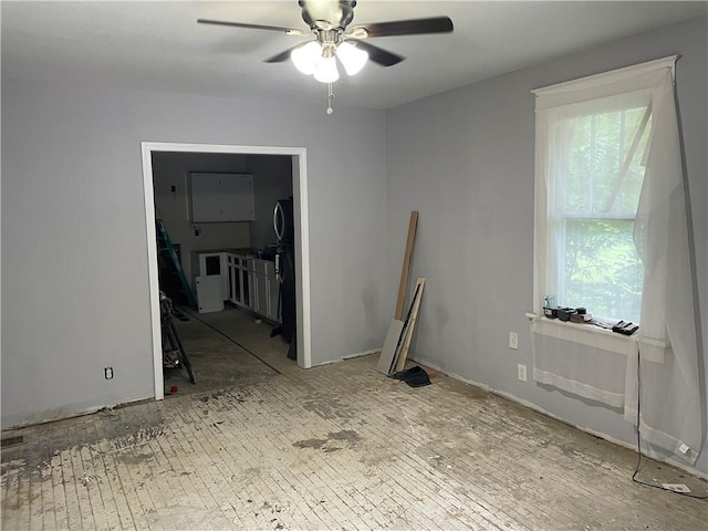 1226 10th Ave, Leavenworth, KS 66048 - empty room featuring ceiling fan