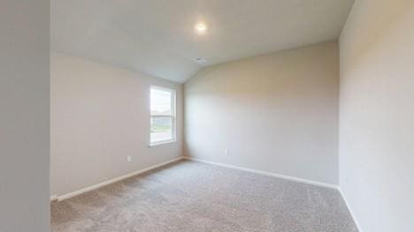 575 W Lanesfield St, Gardner, KS 66030 - empty room featuring carpet and vaulted ceiling