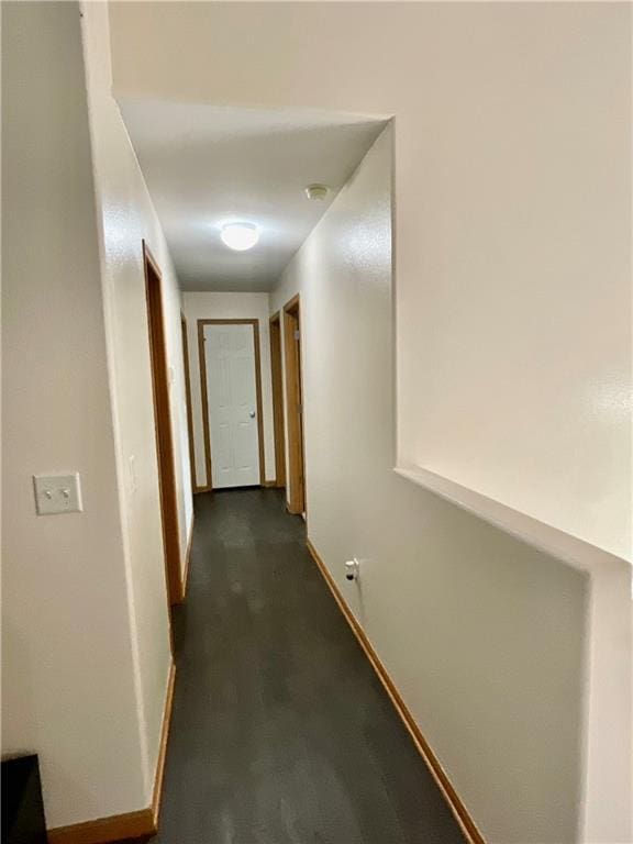 11601 N Manning Ave, Kansas City, MO 64157 - corridor featuring baseboards and dark wood-style floors