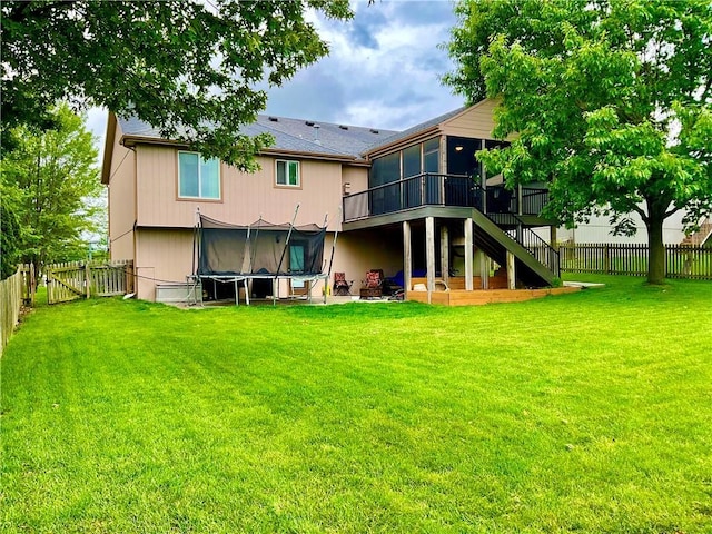 11601 N Manning Ave, Kansas City, MO 64157 - rear view of property featuring a sunroom, stairs, and a gate