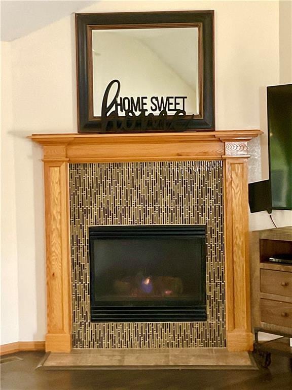 11601 N Manning Ave, Kansas City, MO 64157 - detailed view of a tile fireplace and baseboards