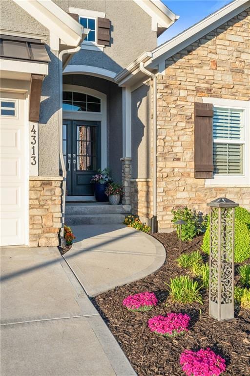 4313 Lakeview Ter, Basehor, KS 66007 - entrance to property with stone siding and stucco siding