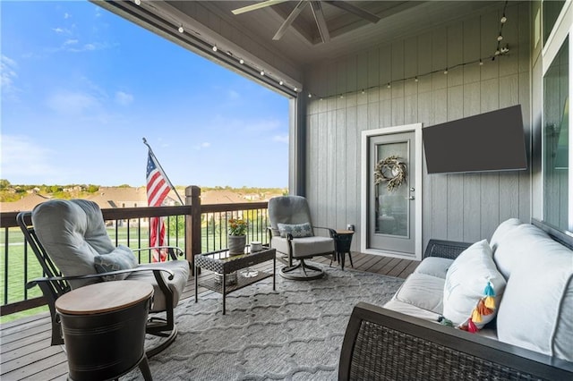 4313 Lakeview Ter, Basehor, KS 66007 - deck featuring a ceiling fan and outdoor lounge area