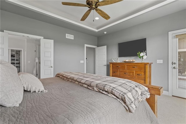 4313 Lakeview Ter, Basehor, KS 66007 - carpeted bedroom featuring ceiling fan, recessed lighting, baseboards, a spacious closet, and a tray ceiling