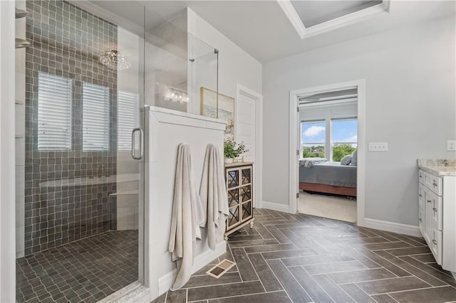 4313 Lakeview Ter, Basehor, KS 66007 - full bath with baseboards, vanity, a shower stall, and ensuite bathroom