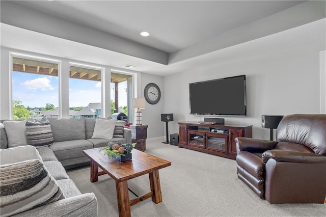 4313 Lakeview Ter, Basehor, KS 66007 - living room featuring light carpet, baseboards, and recessed lighting