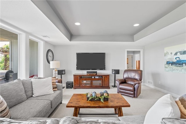 4313 Lakeview Ter, Basehor, KS 66007 - living room with carpet flooring, a tray ceiling, baseboards, and recessed lighting