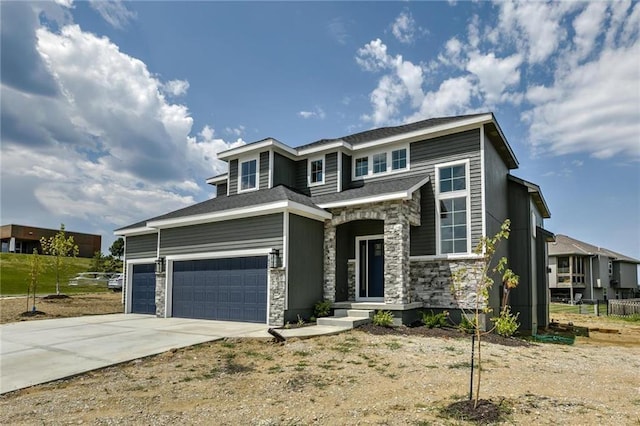 16247 S Kill Creek Rd, Gardner, KS 66030 - view of front of house with stone siding, a garage, and concrete driveway