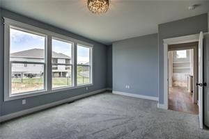 16247 S Kill Creek Rd, Gardner, KS 66030 - carpeted spare room featuring baseboards