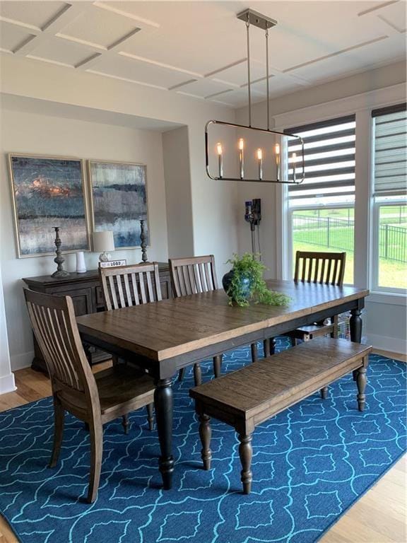 16247 S Kill Creek Rd, Gardner, KS 66030 - dining space featuring wood finished floors and a chandelier