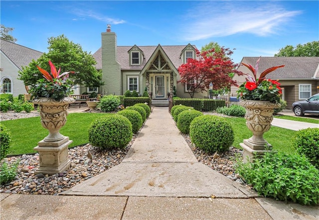 1921 W 48th Ter, Westwood Hills, KS 66208 - view of front of property featuring a chimney and a front yard